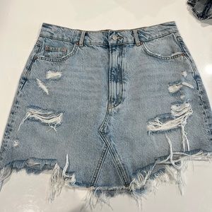 Anthropologie denim distressed skirt.